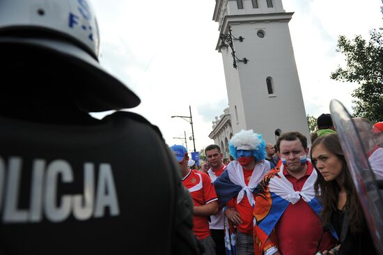 Russian fans march in Warsaw