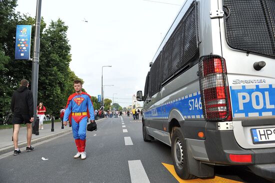 Russian fans march in Warsaw