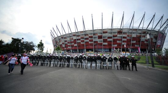 Russian fans march in Warsaw