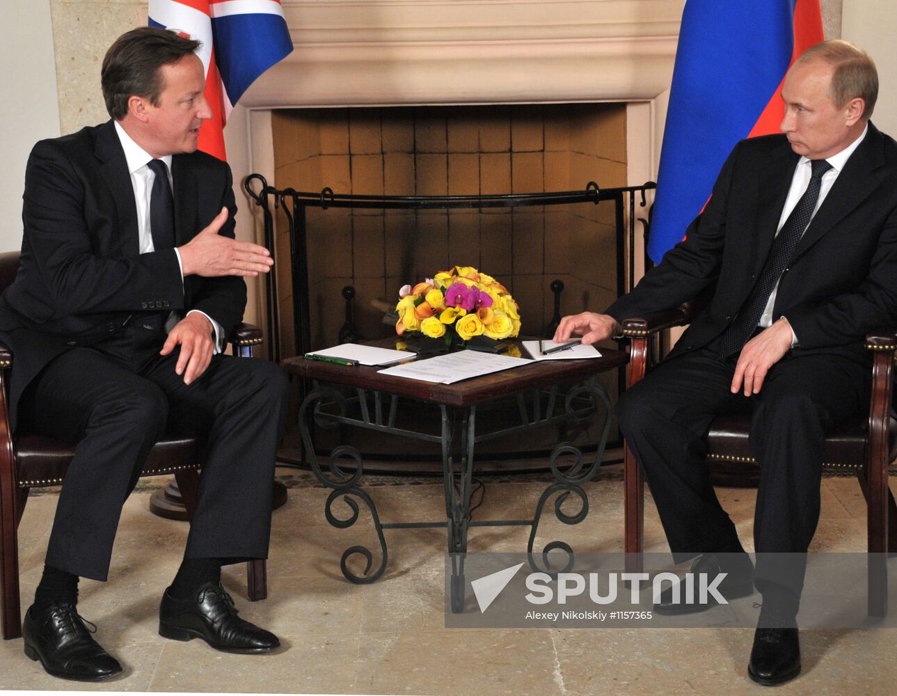 President Vladimir Putin meets with David Cameron in Mexico