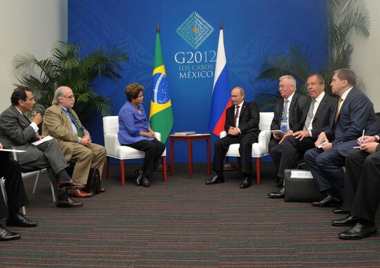 Vladimir Putin meets with Brazilian president Dilma Rusef