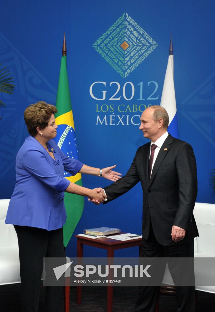 Vladimir Putin meets with Brazilian president Dilma Rusef