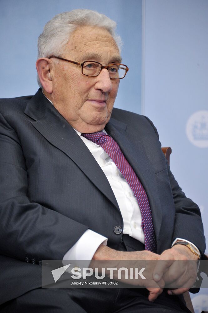 Vladimir Putin meets with Henry Kissinger in St Petersburg