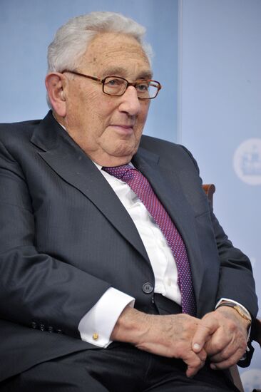 Vladimir Putin meets with Henry Kissinger in St Petersburg