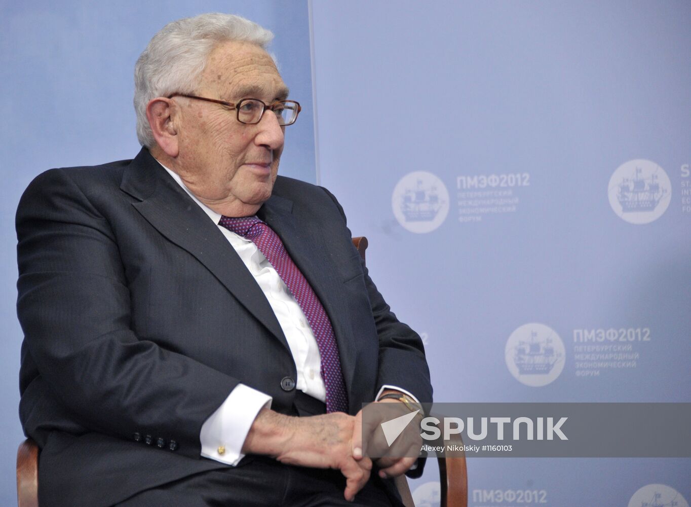 Vladimir Putin meets with Henry Kissinger in St Petersburg