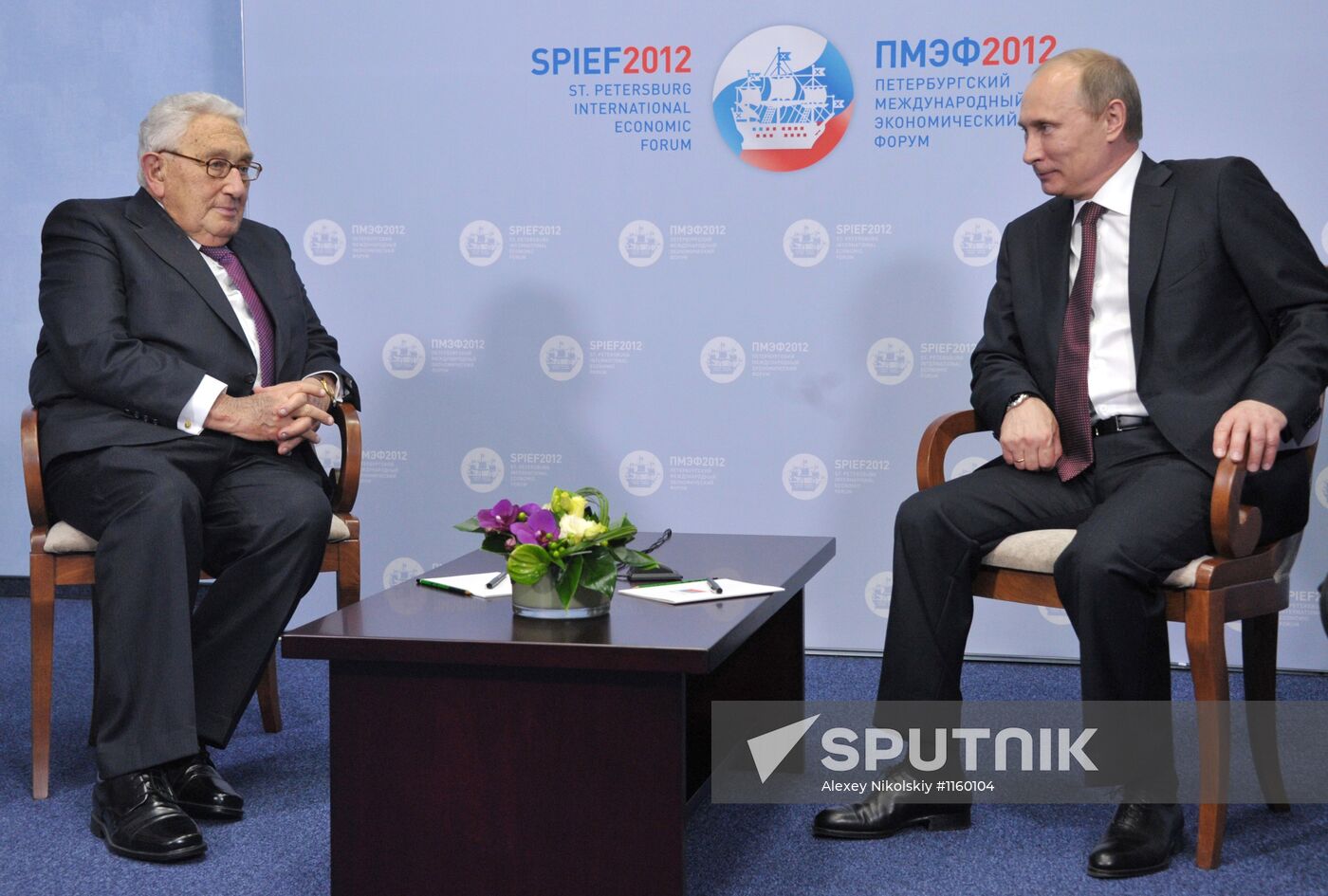 Vladimir Putin meets with Henry Kissinger in St Petersburg