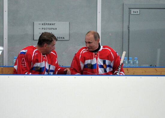 V. Putin and S.Niiniste take part in a friendly hockey match