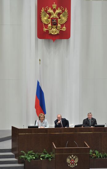 Vladimir Putin speaks at Federation Council meeting