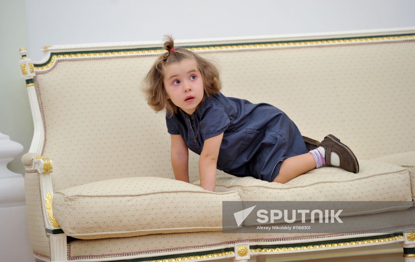 Vladimir Putin meets with girl who was given heart transplant