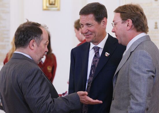 Vladimir Putin meets with Russian Olympic team