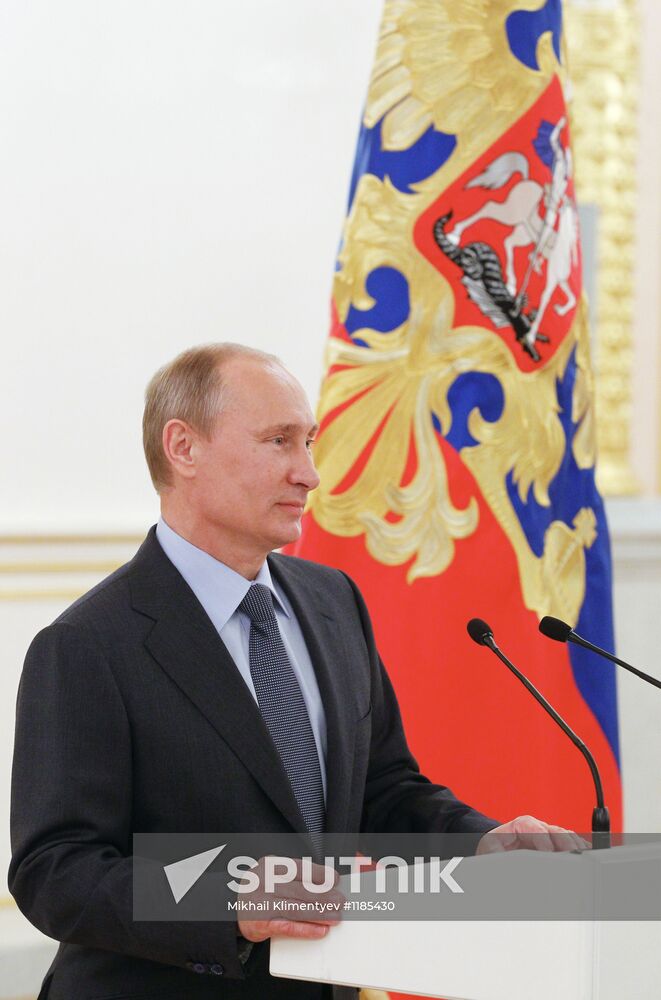 Vladimir Putin meets with Russian Olympic team