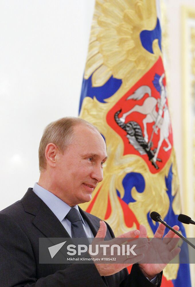 Vladimir Putin meets with Russian Olympic team