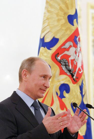 Vladimir Putin meets with Russian Olympic team