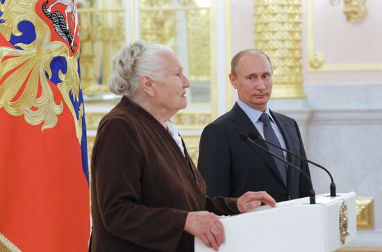 Vladimir Putin meets with Russian Olympic team