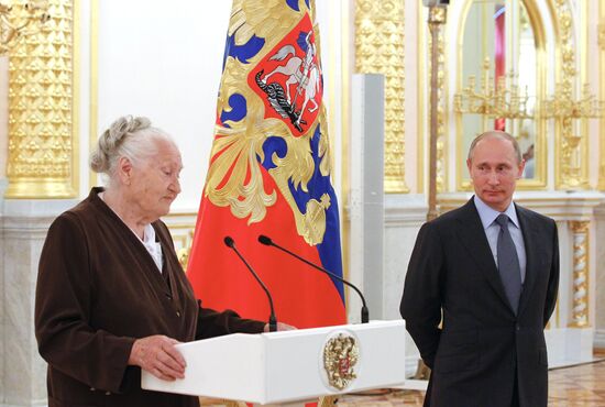 Vladimir Putin meets with Russian Olympic team