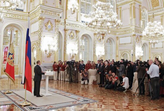 Vladimir Putin meets with Russian Olympic team