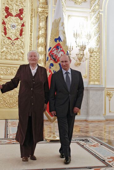 Vladimir Putin meets with Russian Olympic team