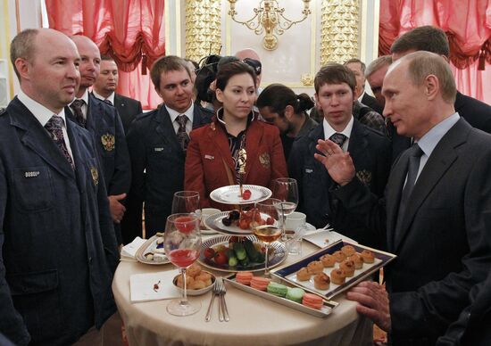 Vladimir Putin meets with Russian Olympic team