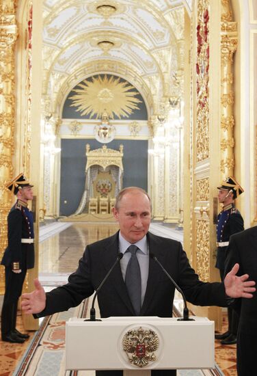 Vladimir Putin meets with Russian Olympic team