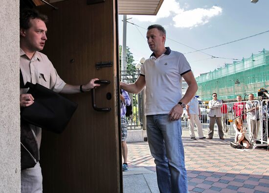 Charges filed against blogger Alexei Navalny