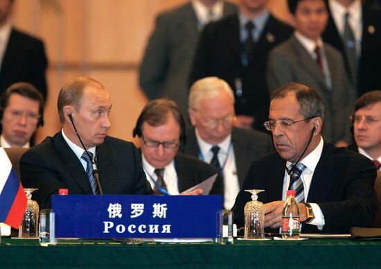 VLADIMIR PUTIN AND SERGEI LAVROV