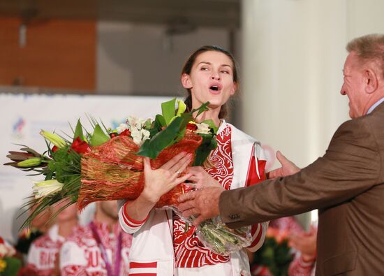 Russian national team arrives home from Olympic Games in London