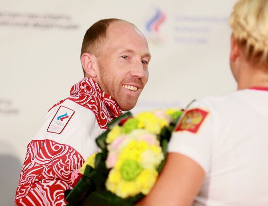 Russian national team arrives home from Olympic Games in London