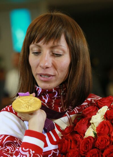Russian national team arrives home from Olympic Games in London