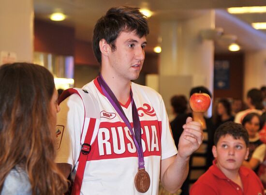 Russia's basketball team back in Moscow after the Olympics