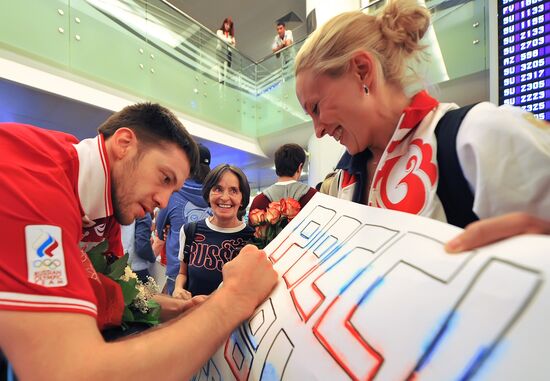 Russia's basketball team back in Moscow after the Olympics