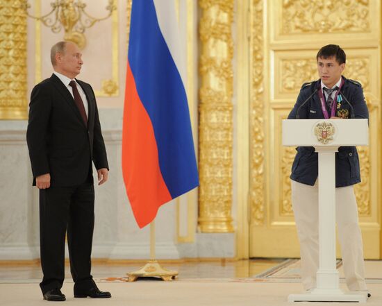 Vladimir Putin presents state awards to Russian Olympic athletes
