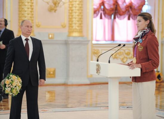 Vladimir Putin presents state awards to Russian Olympic athletes