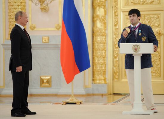 Vladimir Putin presents state awards to Russian Olympic athletes