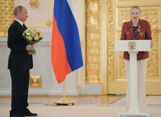 Vladimir Putin presents state awards to Russian Olympic athletes