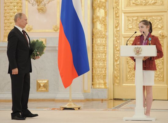 Vladimir Putin presents state awards to Russian Olympic athletes