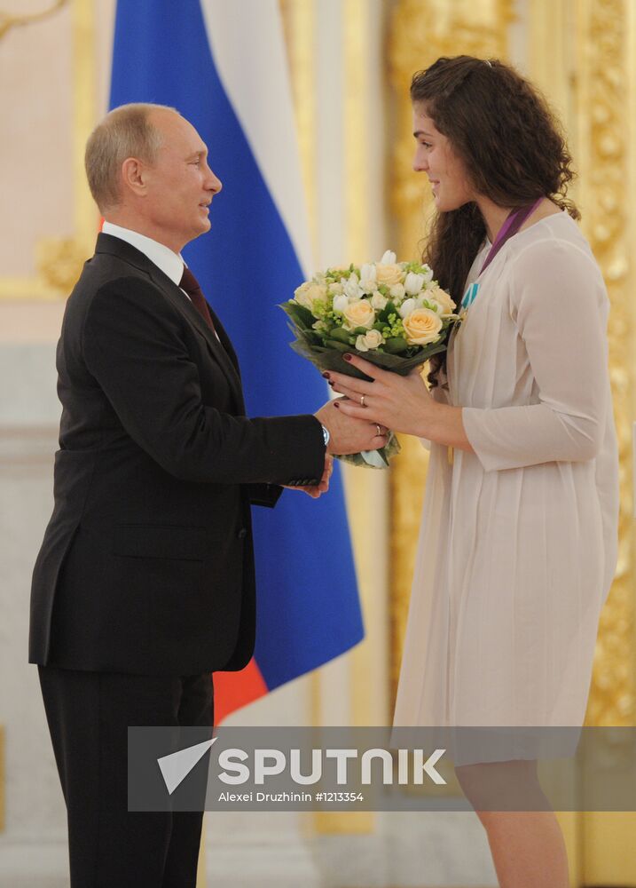 Vladimir Putin presents state awards to Russian Olympic athletes