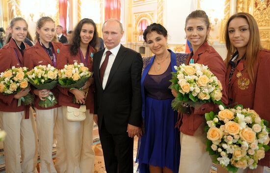 Vladimir Putin presents state awards to Russian Olympic athletes