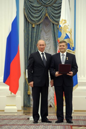 President Vladimir Putin presents state awards in the Kremlin