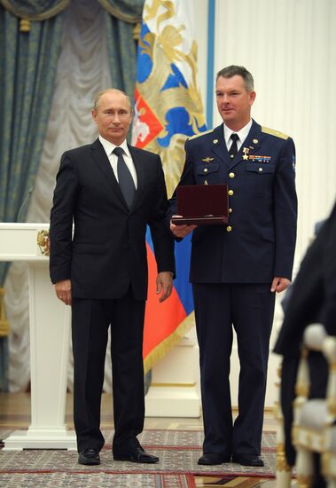 President Vladimir Putin presents state awards in the Kremlin