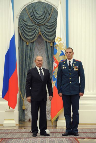 President Vladimir Putin presents state awards in the Kremlin