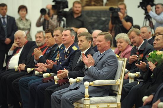 Russian President Putin presents state awards in the Kremlin