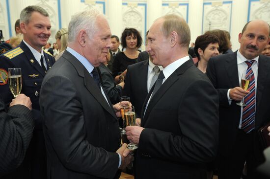 Russian President Putin presents state awards in the Kremlin