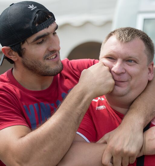Athlete Magomed Omarov massage therapist Alexei Trapeznikov