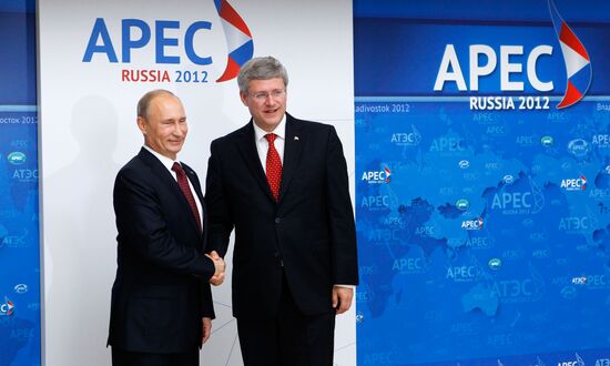 APEC economic leaders gather for their first meeting