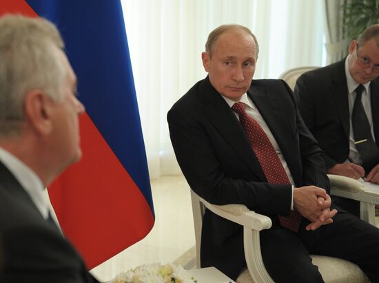 Russian President Vladimir Putin meets his Serbian counterpart