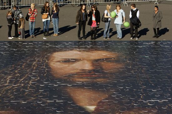 Giant puzzle of painting by Dürer on Palace Square