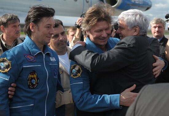 Soyuz TMA-04M crew back from International Space Station