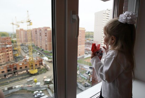 Large family take up residence in new flat