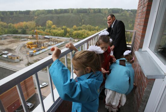 Large family take up residence in new flat