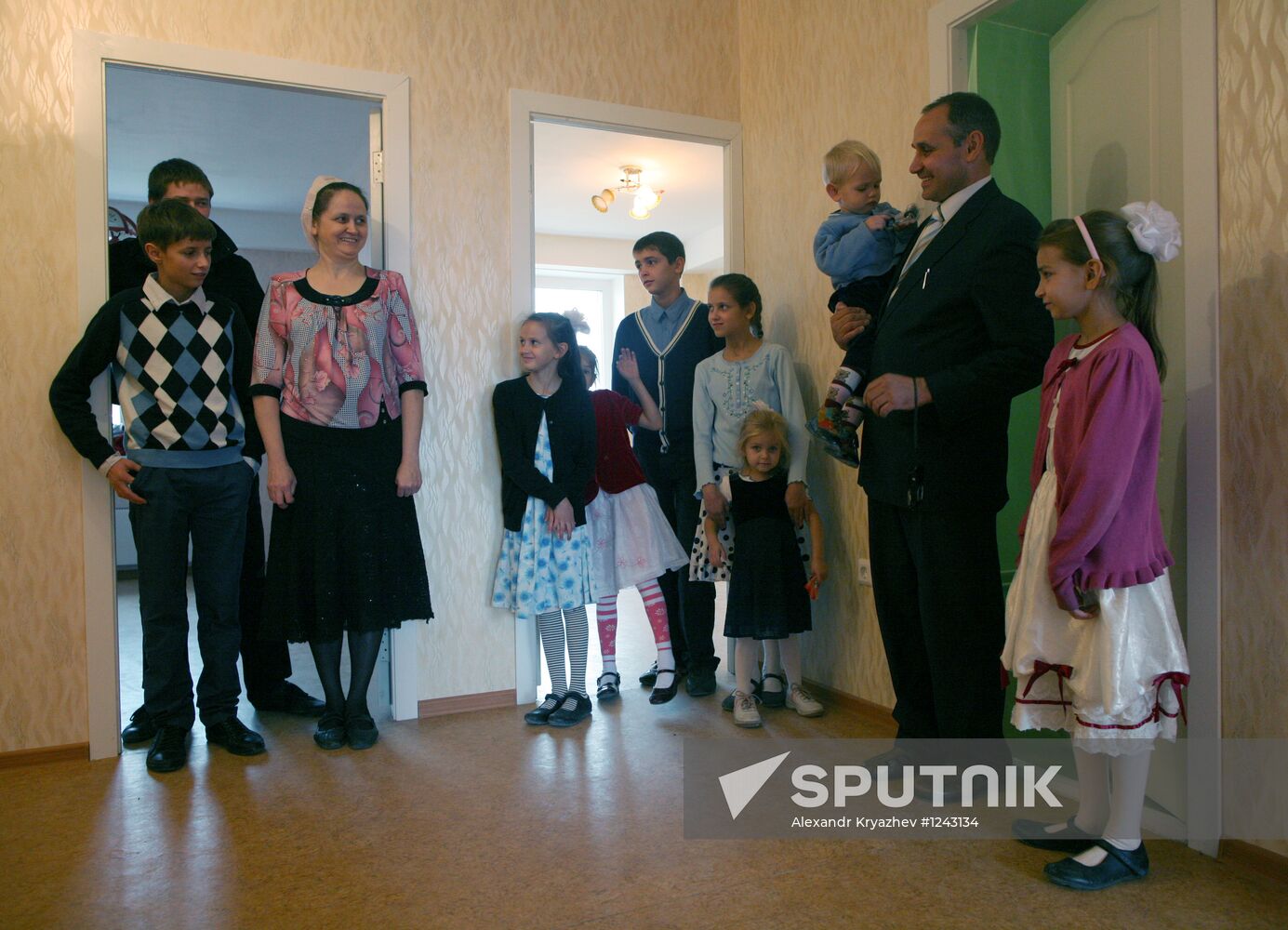 Large family take up residence in new flat